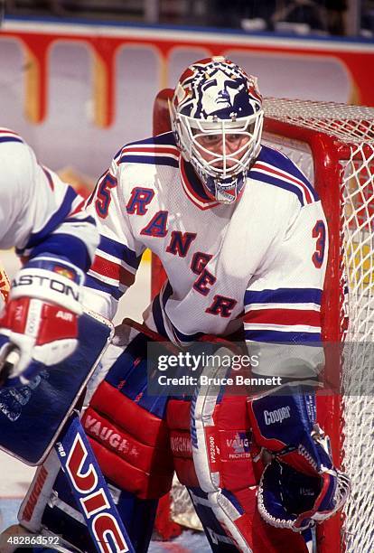 Goalie Mike Richter of the New York Rangers defends the net during an NHL game in November, 1993 at the Madison Square Garden in New York, New York.