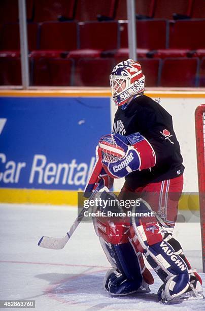 Goalie Mike Richter of the New York Rangers defends the net during practice before Game 3 of the 1994 Stanley Cup Finals against the Vancouver...