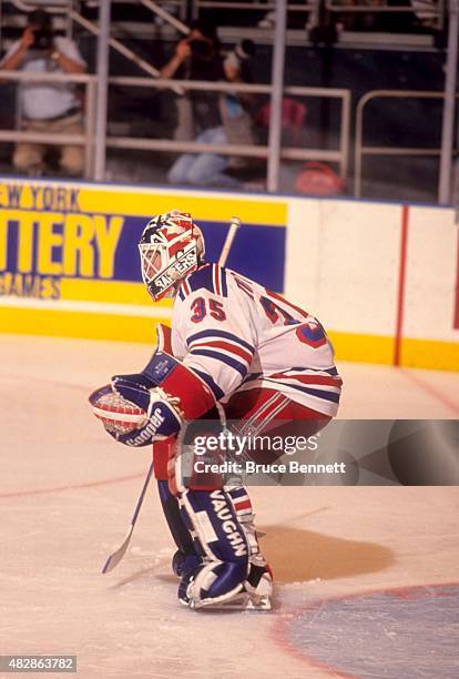 Goalie Mike Richter of the New York Rangers defends the net during Game 5 of the 1994 Eastern Conference Finals against the New Jersey Devils on May...