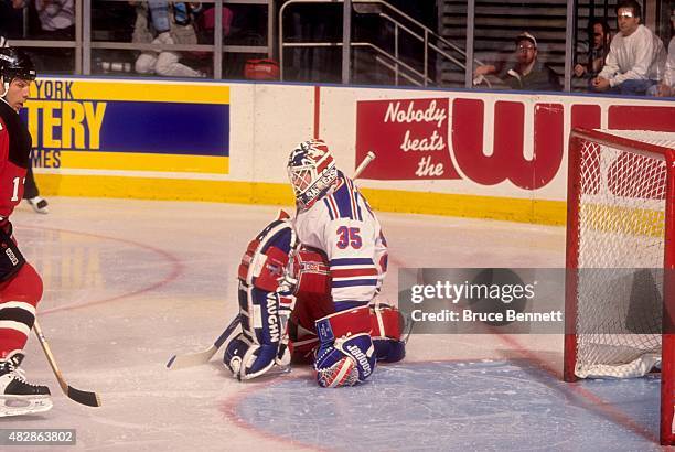 Goalie Mike Richter of the New York Rangers defends the net during Game 1 of the 1994 Eastern Conference Finals against the New Jersey Devils on May...