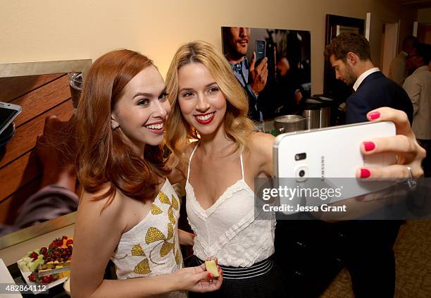 Actresses Elizabeth McLaughlin and Alona Tal of Amazon Studios' 'Hand Of God' take a selfie at the Getty Images Portrait Studio powered by Samsung...