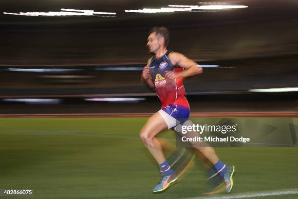 Daniel Giansiracusa of the Bulldogs runs laps 20 minutes after celebrating his winning goal during the round three AFL match between the Western...