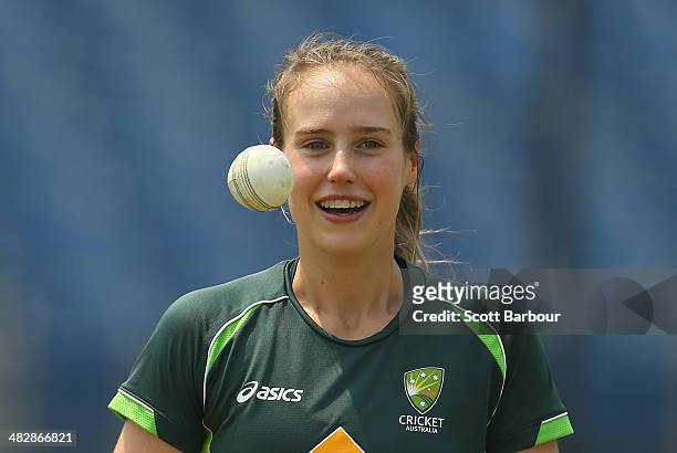 Ellyse Perry of Australia laughs during an Australia Women's nets session ahead of the ICC World Twenty20 Bangladesh 2014 Womens Final at Khan Shaheb...