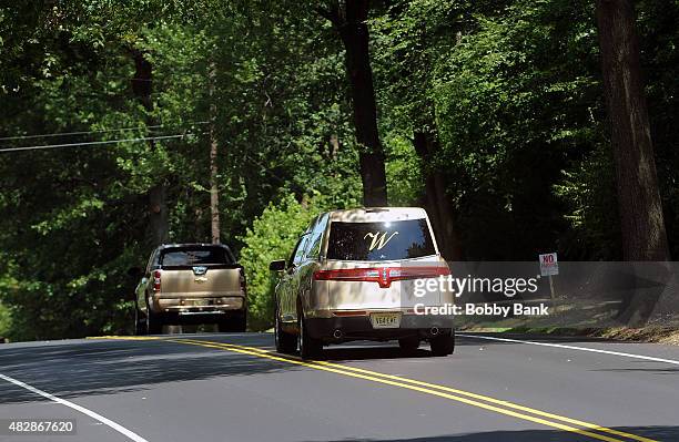 The Wingham Funeral Home hearse leaves Fairview Cemetery that was carrying the body of Bobbi Kristina Brown at Fairview Cemetery on August 3, 2015 in...