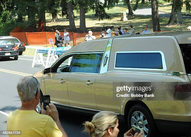 The Wingham Funeral Home hearse leaves Fairview Cemetery that was carrying the body of Bobbi Kristina Brown at Fairview Cemetery on August 3, 2015 in...