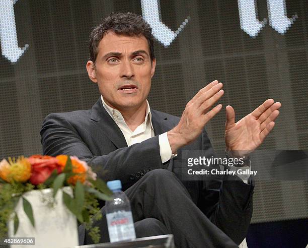 Actor Rufus Sewell speaks onstage during the 'The Man In The High Castle' panel discussion at the Amazon Studios portion of the 2015 Summer TCA Tour...