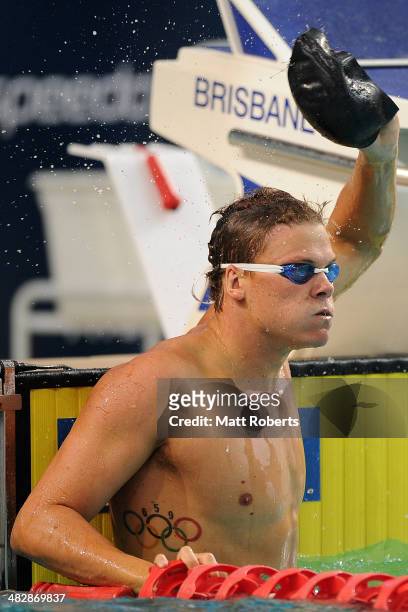 Christopher Wright celebrates winning the final of the Mens 100 metre Butterfly event during the 2014 Australian Swimming Championships at Brisbane...