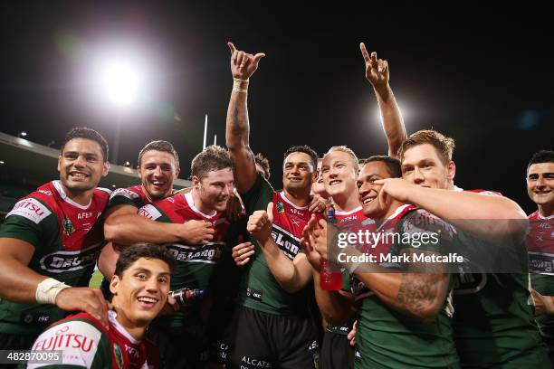 Rabbitohs players acknowledge their fans after victory in the round five NRL match between the St George Illawarra Dragons and the South Sydney...