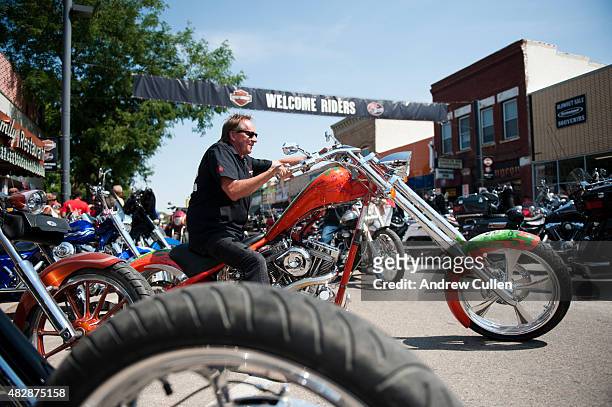 Biker rides downtown on the first day of the annual Sturgis Motorcycle Rally August 3, 2015 in Sturgis, South Dakota. This year marks the...