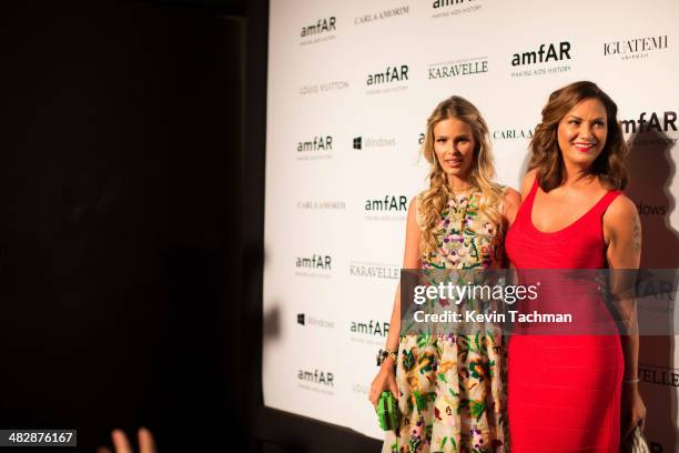 Yasmin Brunet, left, and Luiza Brunet attend the 2014 amfAR's Inspiration Gala Sao Paulo on April 4, 2014 in Sao Paulo, Brazil.
