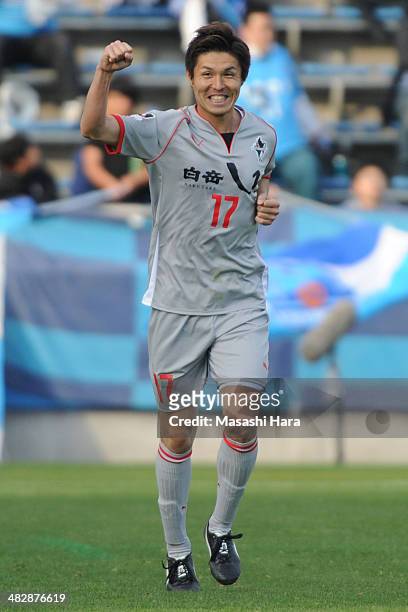 Kazuki Saito of Roasso Kumamoto celebrates the first goal during the J.League second division match between Yokohama F.C. V Roasso Kumamoto at...