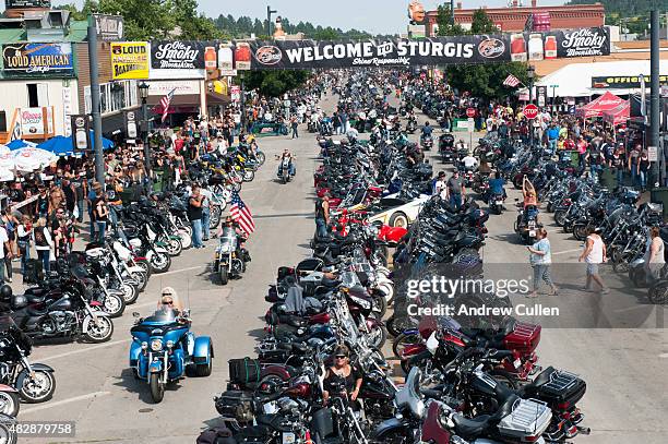 Bikers ride down Main Street on the first day of the annual Sturgis Motorcycle Rally August 3, 2015 in Sturgis, South Dakota. This year marks the...