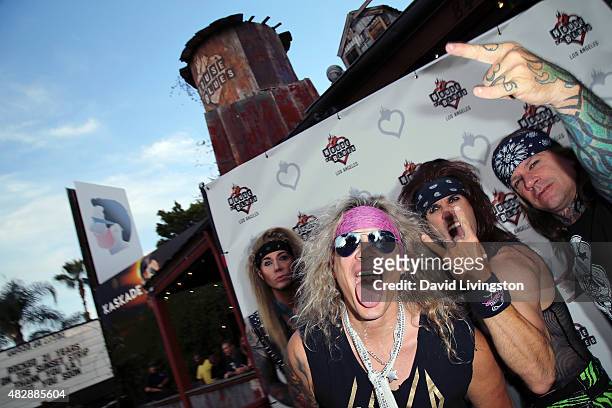 Steel Panther members pose at the House of Blues Sunset Strip final farewell show at House of Blues Sunset Strip on August 3, 2015 in West Hollywood,...