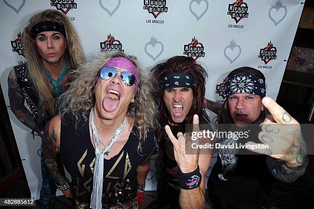 Steel Panther members pose at the House of Blues Sunset Strip final farewell show at House of Blues Sunset Strip on August 3, 2015 in West Hollywood,...