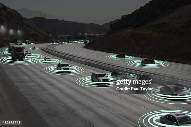 light trails as vehicles communicate - connected car stock-fotos und bilder