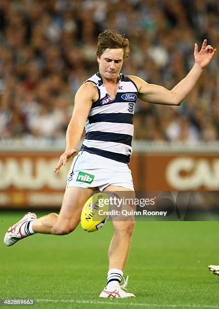 Mitch Duncan of the Cats kicks during the round three AFL match between the Collingwood Magpies and the Carlton Blues at Melbourne Cricket Ground on...