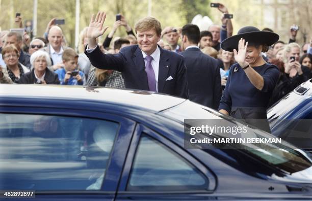 King Willem-Alexander and Queen Maxima of the Netherlands wave to the King and Queen of Sweden after a joint visit to the Rijksmuseum in Amsterdam,...