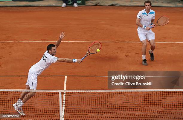 Andy Murray and Colin Fleming of Great Britain in action against Simone Bolelli and Fabio Fognini of Italy during day two of the Davis Cup World...