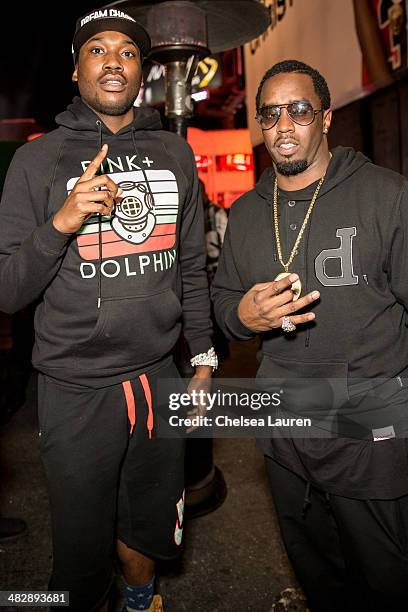 Rapper Meek Mill and entertainment mogul Sean "Diddy" Combs attend Christian Casey Combs' 16th birthday party at 1OAK on April 4, 2014 in West...