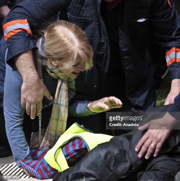 Woman mourns over the death body of 3.5-year-old Pamir Dikdik on April 5 in Zekeriyakoy, a prestigious residential area of Istanbul, Turkey. Pamir...