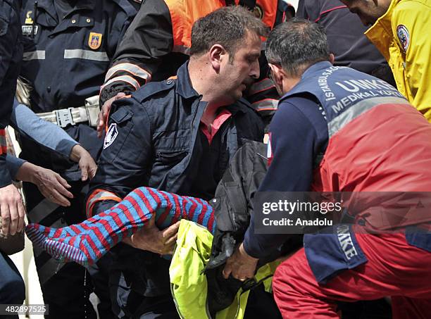 The death body of 3.5-year-old Pamir Dikdik is being carried on April 5 in Zekeriyakoy, a prestigious residential area of Istanbul, Turkey. Pamir was...