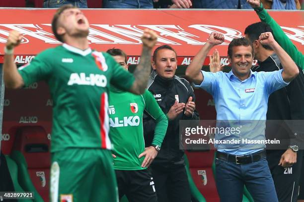 Markus Weinzierl, head coach of Augsburg celebrates winning the Bundesliga match between FC Augsburg and FC Bayern Muenchen at SGL Arena on April 5,...