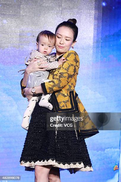 Film producer Zhang Ziyi and the son of director Wei Nan attend the press conference of Wei Nan and Wei Min's film "The Baby From Universe" on August...