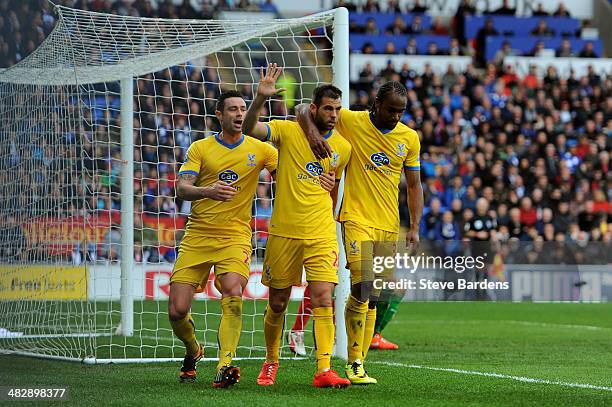 Joe Ledley of Crystal Palace is congratulated by teammates after scoring is team's second goal during the Barclays Premier League match between...