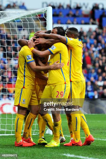 Joe Ledley of Crystal Palace is congratulated by teammates after scoring is team's second goal during the Barclays Premier League match between...