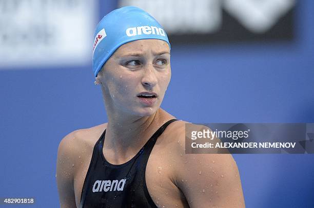 Russia Veronika Popova looks at the time board after a preliminary heat of the women's 200m freestyle swimming event at the 2015 FINA World...