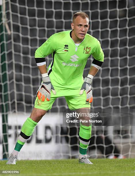 Cody Cropper of MK Dons in action during the Pre-Season Friendly match between MK Dons and Chelsea XI at Stadium mk on August 3, 2015 in Milton...