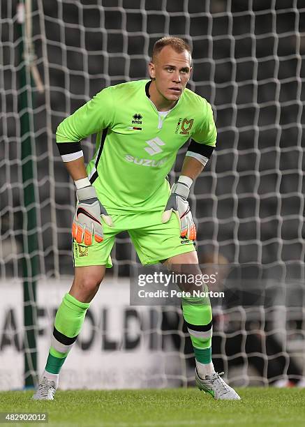 Cody Cropper of MK Dons in action during the Pre-Season Friendly match between MK Dons and Chelsea XI at Stadium mk on August 3, 2015 in Milton...