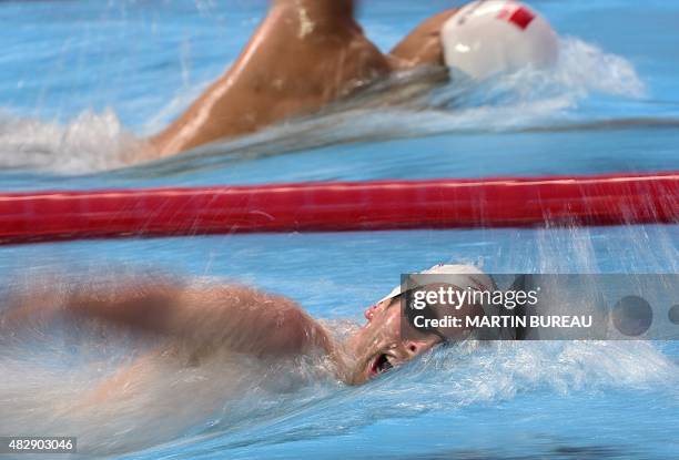 Canada's Ryan Cochrane competes in the preliminary heats of the men's 800m freestyle swimming event at the 2015 FINA World Championships in Kazan on...