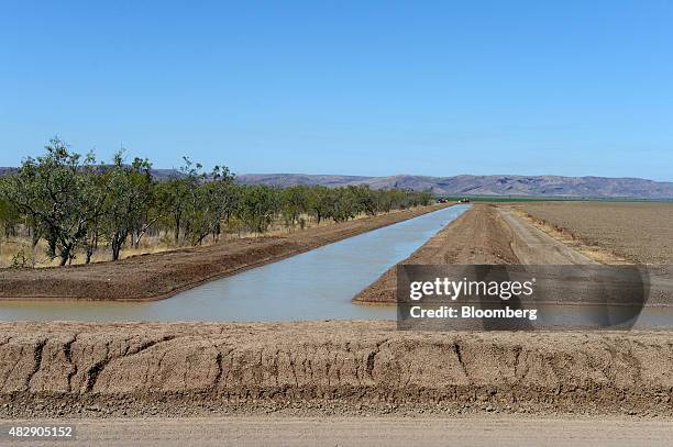 Water from the Ord River runs through an irrigation channel on farmland operated by Kimberley Agricultural Investment, a subsidiary of Shanghai...