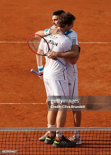 Andy Murray and Colin Fleming of Great Britain celebrate match point against Simone Bolelli and Fabio Fognini of Italy during day two of the Davis...