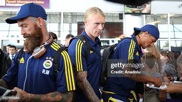 Raul Meireles , Simon Kjaer and Bruno Alves of Fenerbahce arrive in Lviv province of Ukraine on August 4, 2015 ahead of the UEFA Champions League...