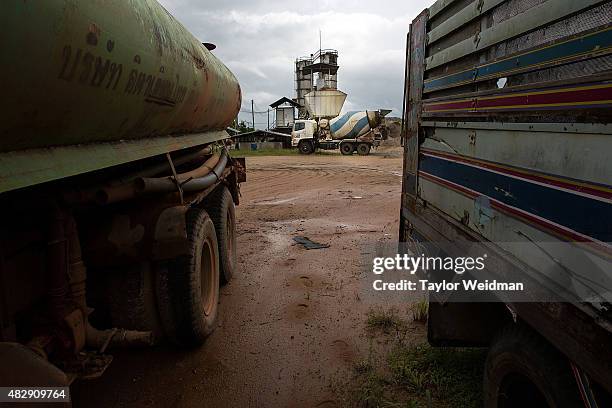 Cement truck and plant sit idle inside the Dawei SEZ on August 2, 2015 in Nabule, Myanmar. The controversial, multi-billion dollar Dawei special...