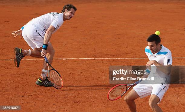 Andy Murray and Colin Fleming of Great Britain in action against Simone Bolelli and Fabio Fognini of Italy during day two of the Davis Cup World...