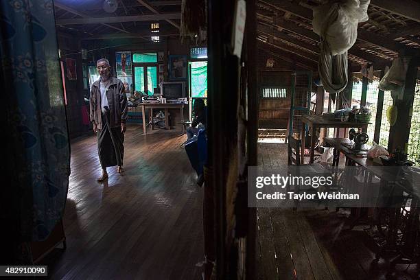 Retired Burmese government worker paces through his house near the Dawei SEZ on August 4, 2015 in Pantininn, Myanmar. The controversial,...