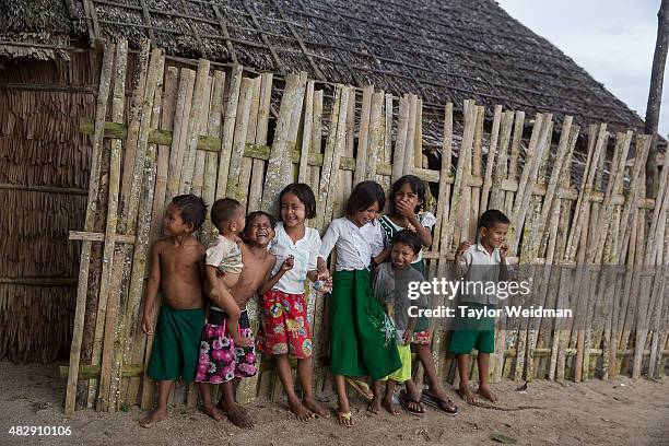 Burmese children laugh in their village near the planned Dawei SEZ on August 3, 2015 in Pantininn, Myanmar. The controversial, multi-billion dollar...