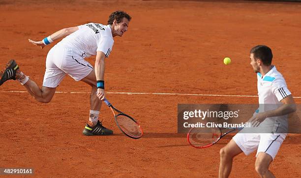 Andy Murray and Colin Fleming of Great Britain in action against Simone Bolelli and Fabio Fognini of Italy during day two of the Davis Cup World...