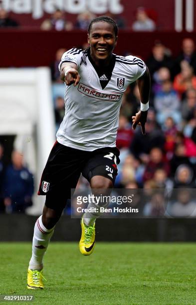 Hugo Rodallega of Fulham celebrates scoring the winning goal during the Barclays Premier League match between Aston Villa and Fulham at Villa Park on...