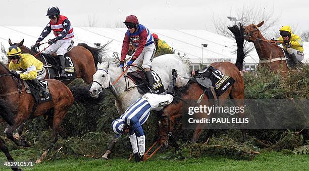 Teaforthree ridden by Nick Scholfield is unseated at The Chair during during the Grand National horse race at Aintree Racecourse in Liverpool,...