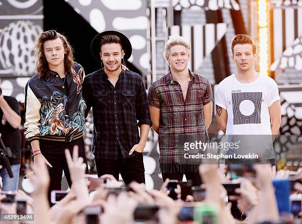 Harry Styles, Liam Payne, Niall Horan, and Louis Tomlinson of One Direction perform on ABC's "Good Morning America" at Rumsey Playfield, Central Park...