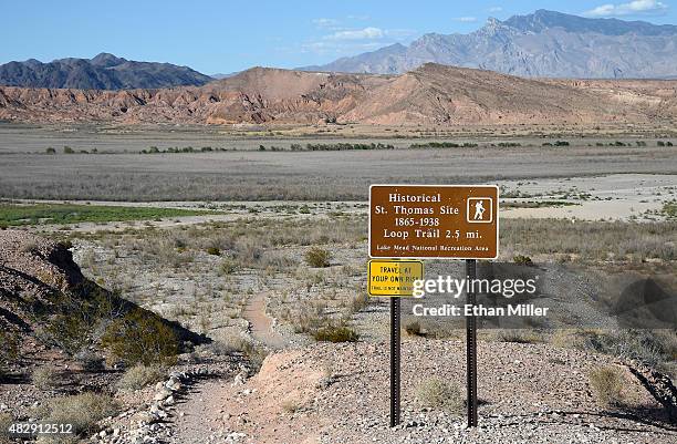 Sign showing the trail to the ghost town of St. Thomas is shown on August 3, 2015 in the Lake Mead National Recreation Area, Nevada. The town was...