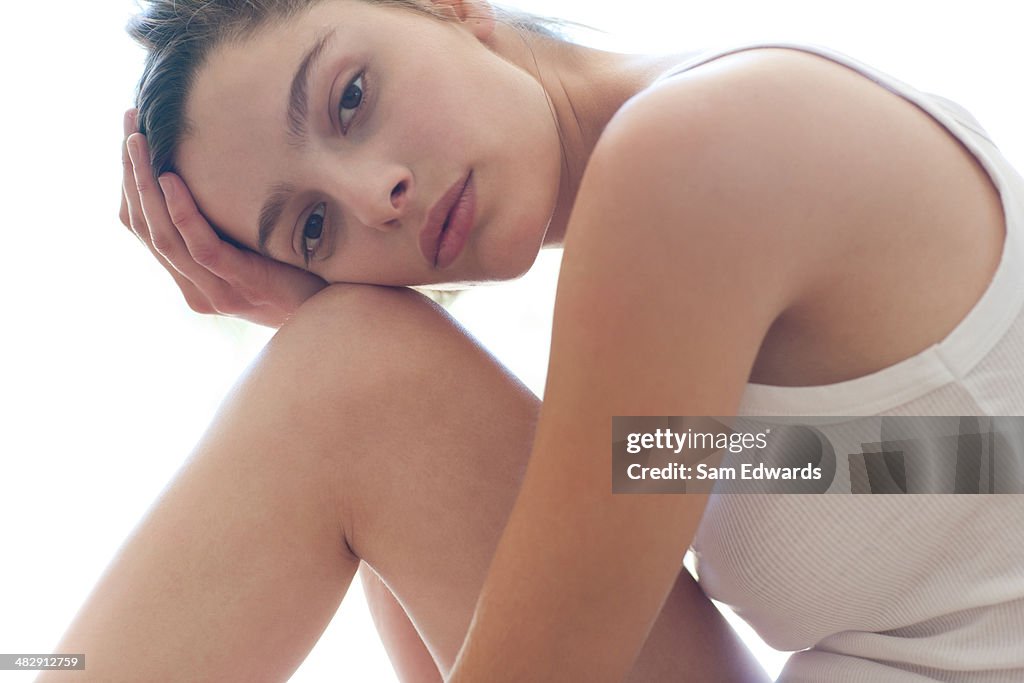 Woman sitting on floor relaxing