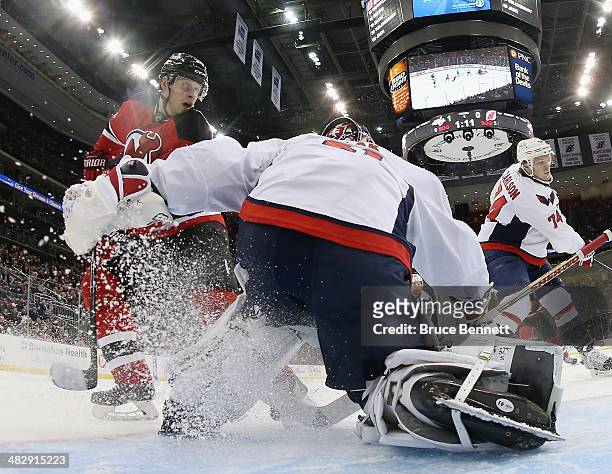 Jaroslav Halak of the Washington Capitals tends net against the New Jersey Devils at the Prudential Center on April 4, 2014 in Newark, New Jersey....