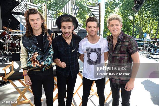 Harry Styles, Liam Payne, Louis Tomlinson and Niall Horan of One Direction pose onstage during ABC's "Good Morning America" at Rumsey Playfield,...