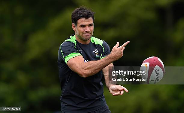 Wales scrum half Mike Phillips in action during Wales training ahead of saturdays World cup warm up match against Ireland at the Vale Hotel on August...