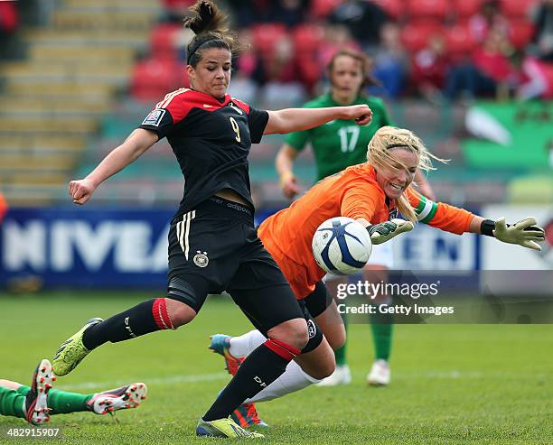 Emma Byrne of Ireland is challenged by Lena Lotzen of Germany but can't prevent her scoring the equalising goal during the FIFA Women's World Cup...